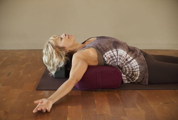 Turn That Yawn Into Yin and Relax Into This Style of Yoga